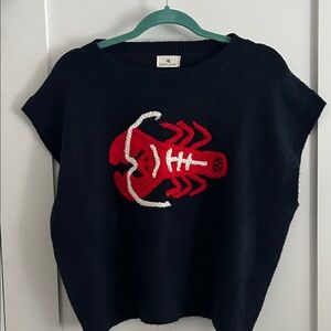Urban Daisy navy cap sleeve lobster sweater
Size M/L